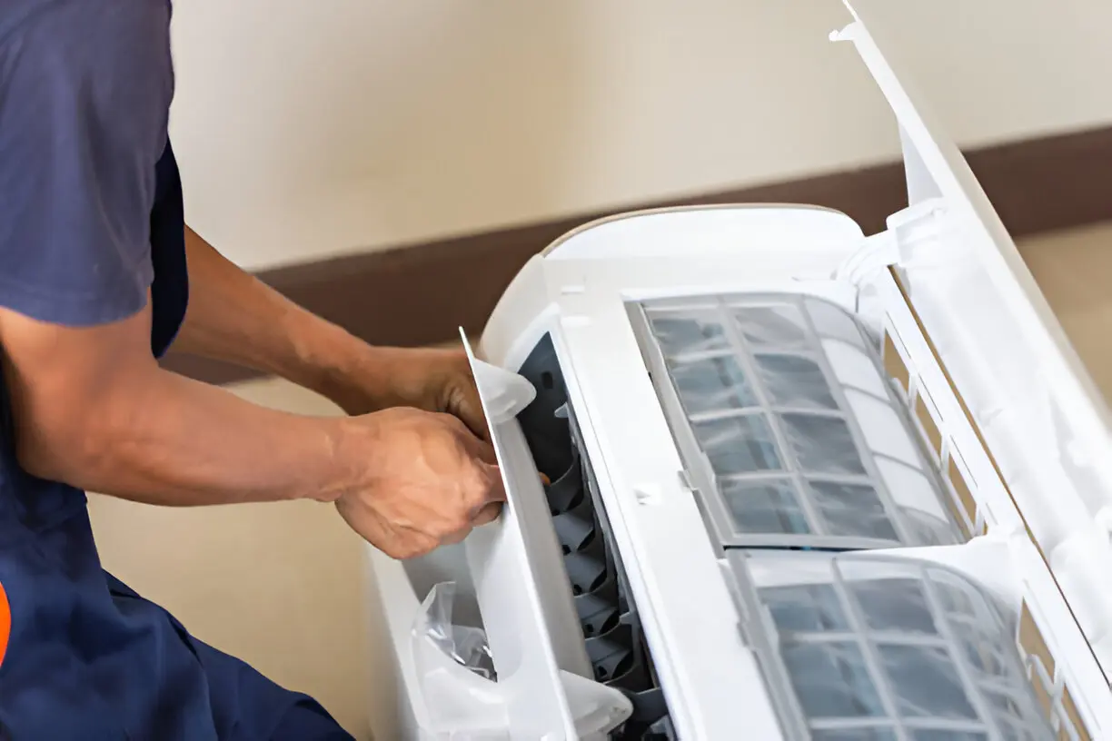 Home 9 Technician performing routine air conditioning service for a home in Orlando, Florida